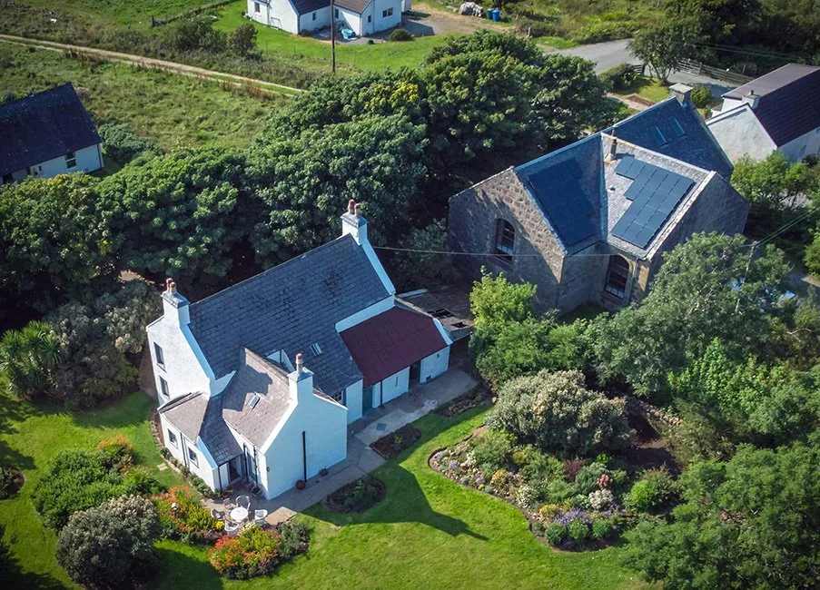Aerial of Kaly's base, a converted church and manse on Waternish